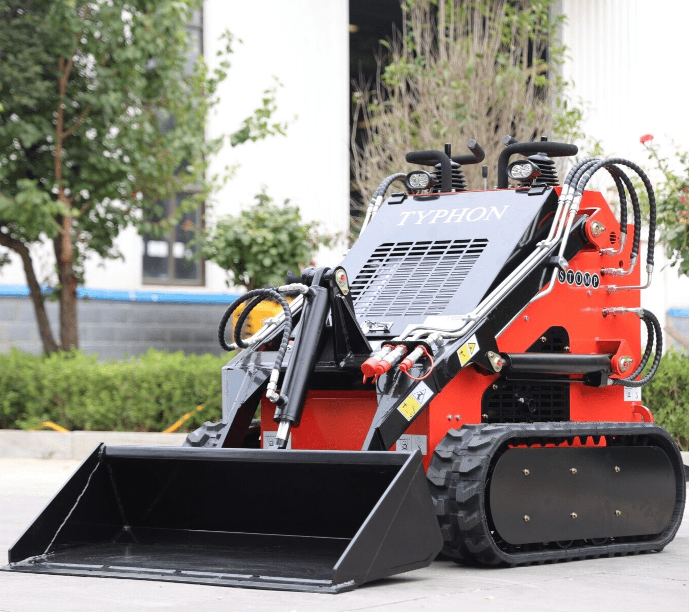 TYPHON STOMP skid steer side profile with rubber tracks