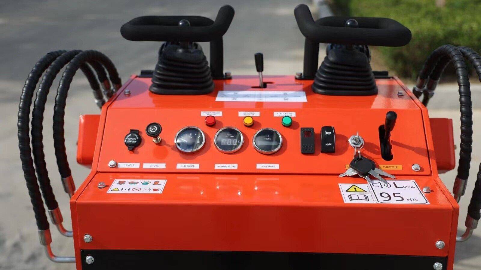 TYPHON STOMP skid steer working in the field